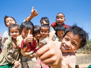 Happy asian children with thumbs up, Shan state, Myanmar