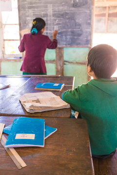 Child attending a lesson at a primary school in a village of the Chin state, Myanmar
