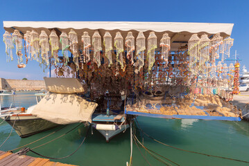 Fishing boat with souvenirs in Mandrak harbor on Rhodes island.