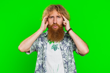 Displeased exhausted young man guy rubbing temples to cure headache problem, suffering from...