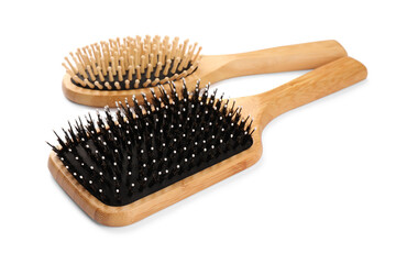 New wooden hair brushes isolated on white