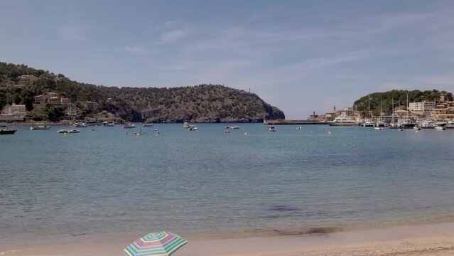 a panning right clip of the beach at port de soller on mallorca, spain