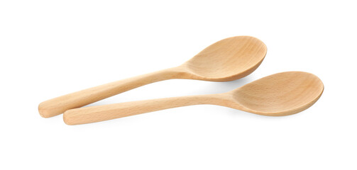 Two empty wooden spoons isolated on white