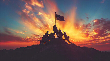 Silhouettes of soldiers raising a flag on a hill, against a dramatic sunset, evoke the iconic Iwo Jima scene representing sacrifice and victory. - obrazy, fototapety, plakaty