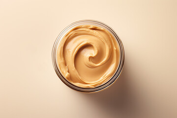 Generative AI Image of Top View of Peanut Butter in a Jar on Pink Background - obrazy, fototapety, plakaty