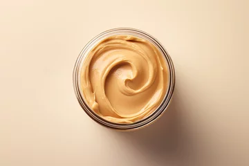 Foto op Plexiglas Generative AI Image of Top View of Peanut Butter in a Jar on Pink Background © heartiny