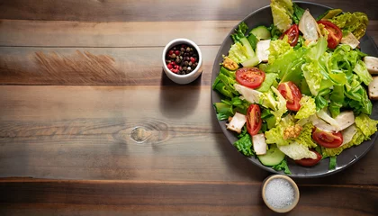 Deurstickers Fresh healthy salad on wooden table. View from above with copy space. high quality photo © Uuganbayar