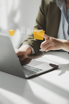 File management and uploading file data to online databases, storing data files on the cloud, managing document data in organizations, managing online databases, using the cloud in companies.