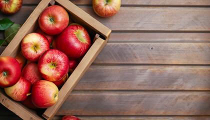 Ripe red apples in wooden box. Top view with space for your text. high-quality photo