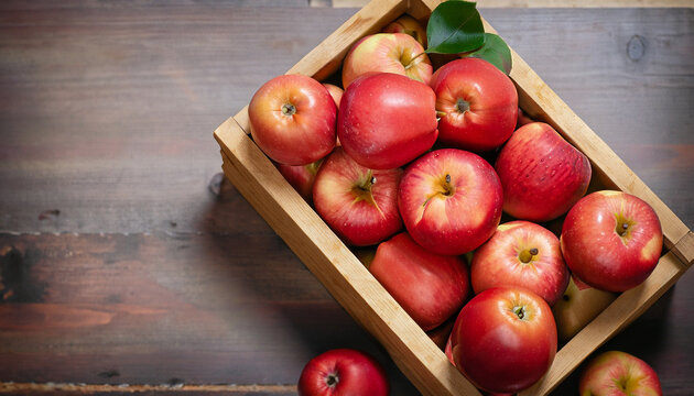 Ripe red apples in wooden box. Top view with space for your text. high-quality photo