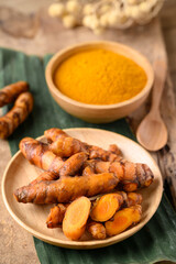 Fresh turmeric and powder, Spice in Asian cuisine