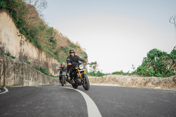 Fototapeta na wymiar leisure activity of indonesian riders traveling by motorbike