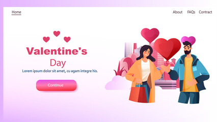 couple holding red air balloons in heart shape happy valentine day holiday celebration concept horizontal copy space