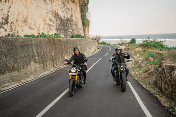indonesian men riders on motorcycle adventure together with friend