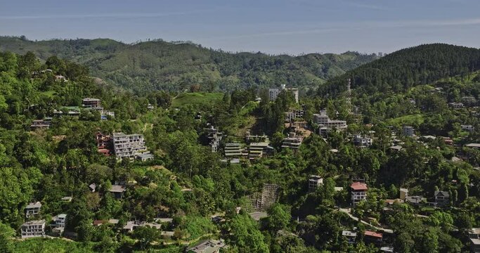 Ella Sri Lanka Aerial v24 drone flyover picturesque town in hill country capturing hillside resort hotels, tranquil retreat surrounded by nature and mountainscape - Shot with Mavic 3 Cine - April 2023