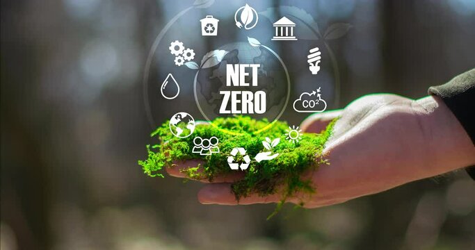 Net zero emission , carbon neutral concept. Net zero greenhouse gas emissions target. Climate neutral long term strategy with green net zero icon  on bokeh background.4k footage 