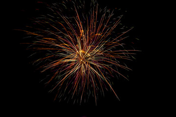 Obraz premium Fireworks. Colorful celebration fireworks isolated on a black sky background.Abstract and brightly colorful firework in the celebration and anniversary festival.New year party light over night sky.