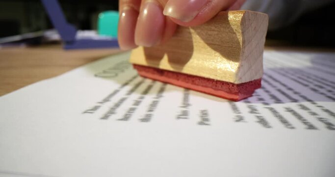 Rejected stamp with on document in office closeup