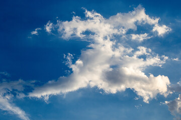 Naklejka na ściany i meble Odd shaped white cloud in a blue sky over southern Africa image for background use