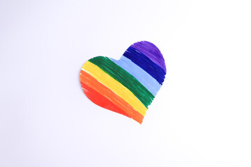 Photograph on light background of hand drawn LGBTQ+ heart. Concept of people and lifestyles.