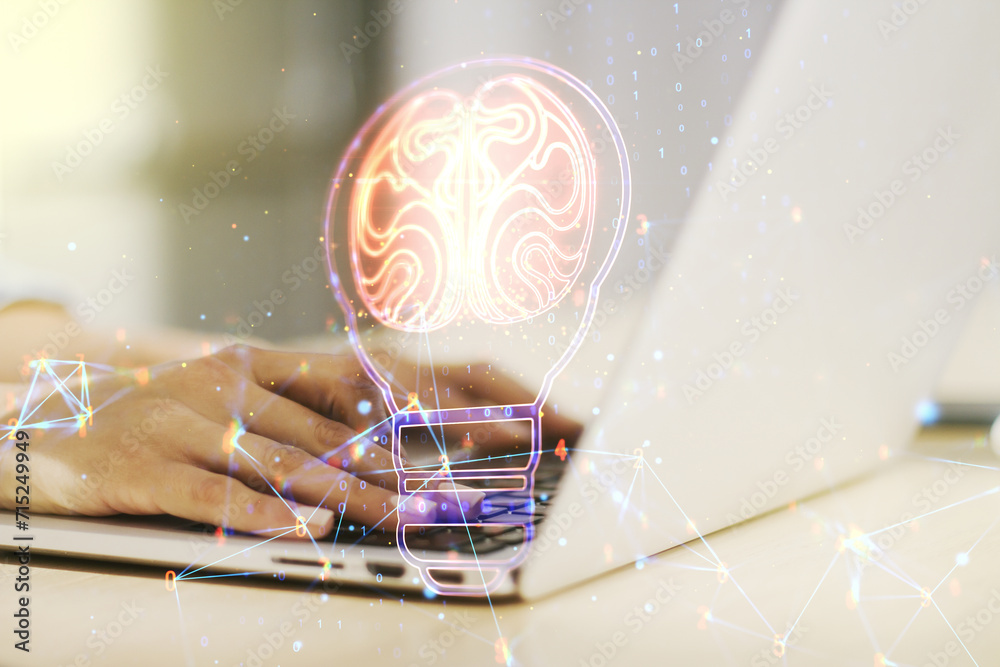 Leinwandbilder Creative light bulb with human brain hologram and with hands typing on computer keyboard on background, artificial Intelligence and neural networks concept. Multiexposure