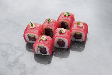 Set of sushi roll with tuna on marble background