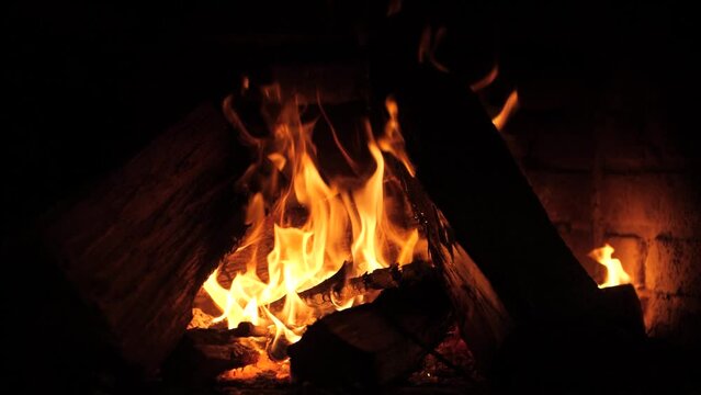Mesmerizing Super Slow-Motion View of an Open Fireplace, Unveiling the Delicate Dance of Flames in an Intimate Display of Cozy Ambiance and Sublime Hearth Magic