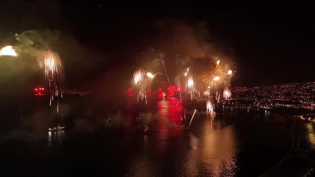 Panoramic aerial view of a fireworks show in the form of rain at the end of the year closing in Valparaiso Chile. 