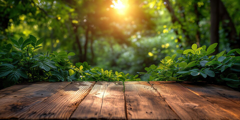 Wooden table with green leaves garden on blurred nature background
