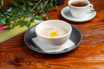 Oatmeal porridge with butter. Breakfast.