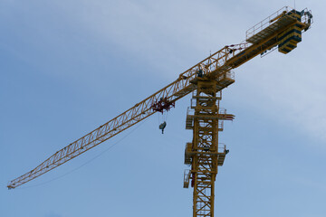 construction crane against blue sky