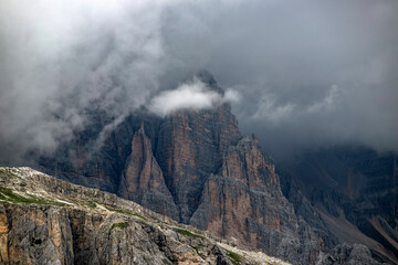 Close up on the rocks of Tofana di Rozes in summer fog in the Dolomites, Italy, Europe