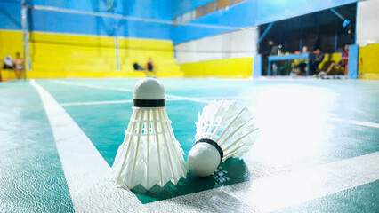 playing batminton at the gor