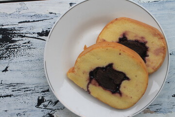 2 slices of Bread rolls in a plate on the table