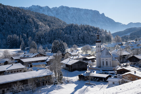 The mountaineering village of Sachrang in Chiemgau, Bavaria, Germany with a view of the Zahmer Kaiser in Tyrol, Austria in winter