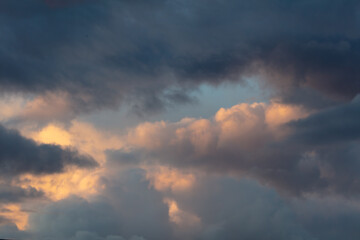 Naklejka na ściany i meble Colorful clouds at sunrise. Background