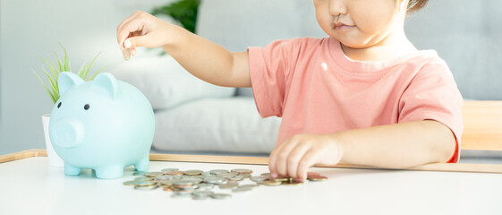 Save money. children putting coin for saving. wealth, Finance, insurance, investment, education, future, plan life, learn, banking, family, health, health and accident insurance..