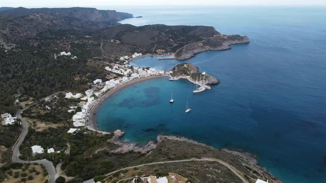 Aerial View Over Kapsali Beach Bay In Kythira Island with a Moored Sailboat, Greece
