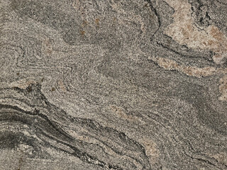 Close up texture of natural stone granite slab pattern in marble looking veining and grains, Seamless texture