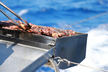 grilled chicken on the barbecue on the yacht