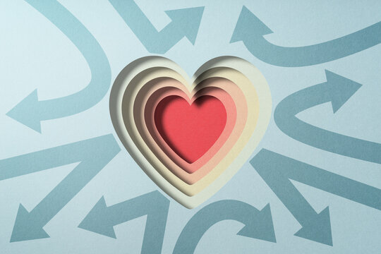 Mental strength and resilience concept. Many arrows and stacked heart shapes.