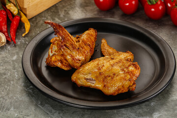 Tasty roasted chicken wing with spices