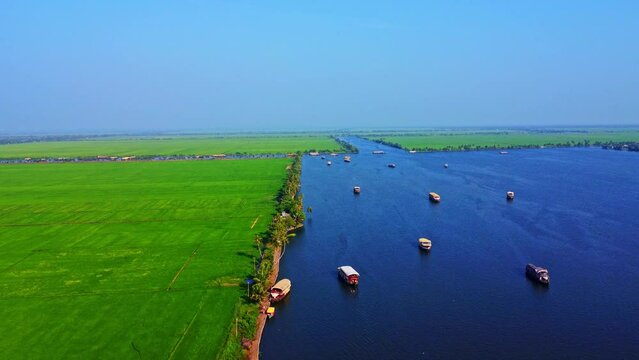 Aerial shot of Houseboats on Kerala backwaters, in Alleppey, Kerala, India
