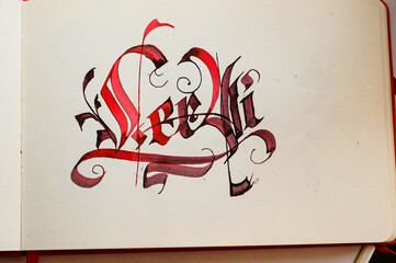 Gothic calligraphy writing with a broad pen 