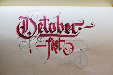 Gothic calligraphy writing with a broad pen October fest