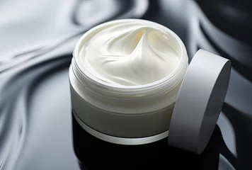 Fotobehang A skincare cosmetics cream jar product displayed against a textured background, featuring ample copy space. © Murda