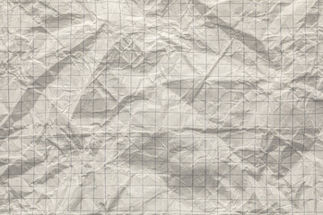 Close-up of graph ruled composition or exercise book paper with rough crumpled texture