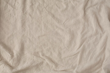 Close view of a wrinkled natural linen fabric for a backdrop