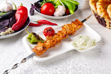 Chicken shashlik on a skewer. Eastern cuisine. Uzbek cuisine.