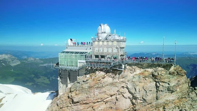 Drone Switzerland 4k. Jungfraujoch observation deck, top of europe summit mountain peak, Swiss Alps. Jungfrau tourism destination in Switzerland.